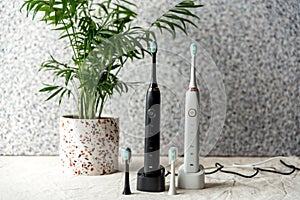 Modern rechargeable sonic or electric toothbrush. Flat lay