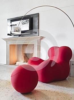 Modern red armchair in living room