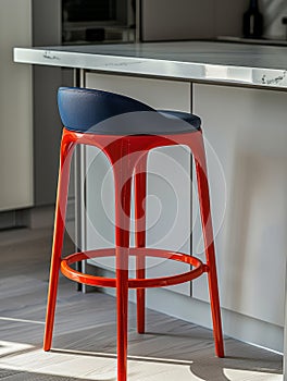 Modern red bar stool in contemporary kitchen setting