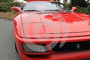 Modern red ferrari f355 sports car front