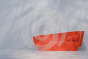 Modern red sofa in minimalistic interior