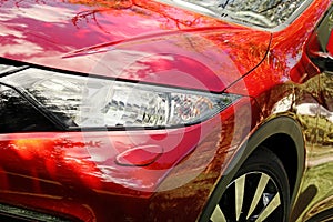 Modern red sport car headlight