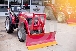 Modern red tractor for Agricultural machinery