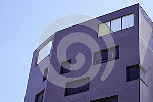 Modern residential apartment white facade building grey cement facade