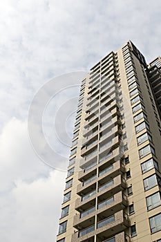 Modern residential building against cloudy sky