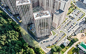 Modern residential building complex with outdoor parking lot. aerial view