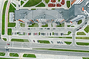 Modern residential building with playground and parking lot. aerial photography