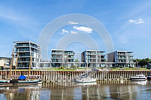 Modern residential buildings by the canal in Stade, Germany