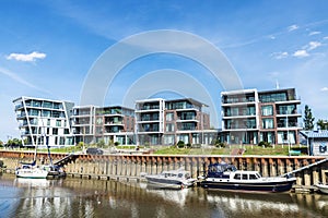 Modern residential buildings by the canal in Stade, Germany