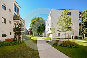 Modern residential buildings in a green environment, sustainable urban planning