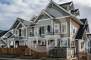 Modern residential houses neighborhood street in a suburban residential area. New and comfortable neighborhood