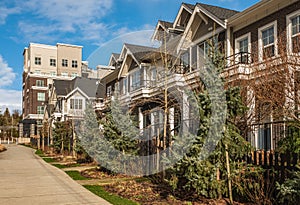 Modern residential houses neighborhood street in a suburban residential area. New and comfortable neighborhood