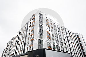 Modern residential multistory apartment buildings. Facade of new houses