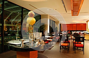 Modern restaurant interior in night illumination