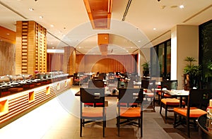 Modern restaurant interior in night illumination