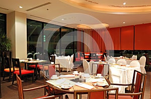 Modern restaurant interior in night illumination