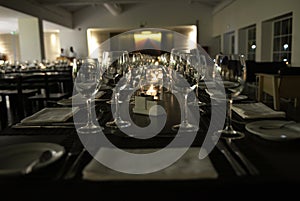 Modern Restaurant - Lighted Candles, White Napkins, Elegant Table Set