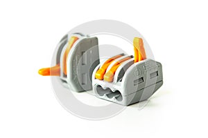 Modern reusable electrical terminals on white background