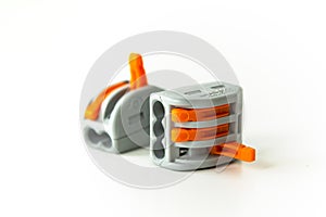 Modern reusable electrical terminals on white background