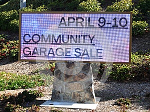 A modern roadside neighborhood digital bulletin board.