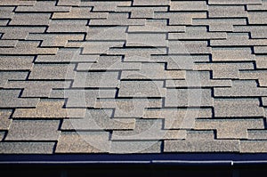 Modern roofing and decoration of chimneys. Flexible bitumen or slate shingles