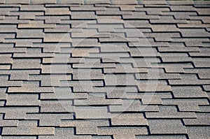 Modern roofing and decoration of chimneys. Flexible bitumen or slate shingles