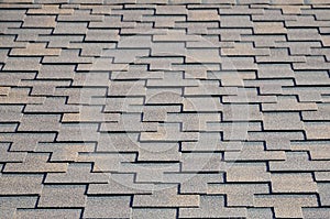 Modern roofing and decoration of chimneys. Flexible bitumen or slate shingles