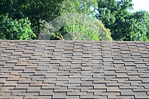 Modern roofing and decoration of chimneys. Flexible bitumen or slate shingles