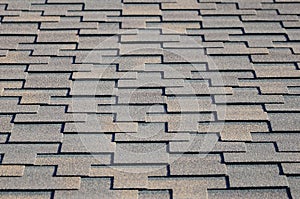 Modern roofing and decoration of chimneys. Flexible bitumen or slate shingles