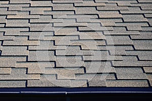 Modern roofing and decoration of chimneys. Flexible bitumen or slate shingles