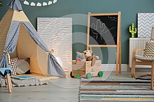 Modern room interior with play tent