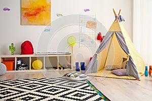 Modern room interior with play tent