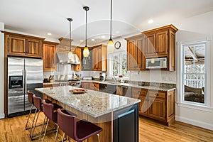 Modern rustic kitchen interior with a marble-top island