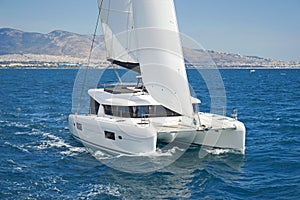 Modern sailing catamaran in action