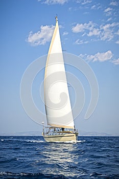 Modern sailing yacht in action photo