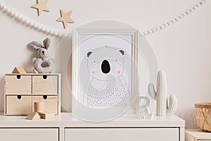 The modern scandinavian newborn baby room with mock up frame, wooden toy, plush toys, decor, children accessories.