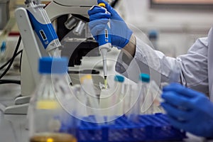 Modern scientist working in biotechnological laboratory