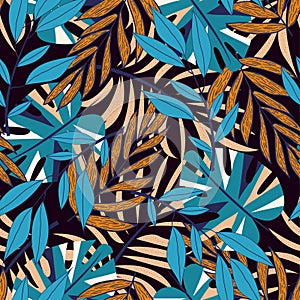 Modern seamless pattern with tropical plants. Fashionable texture design, textile, fabric, printing. Original plants. Tropical lea