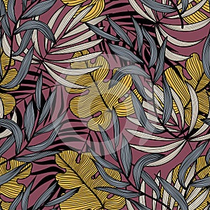 Modern seamless pattern with tropical plants. Fashionable texture design, textile, fabric, printing. Original plants. Tropical lea