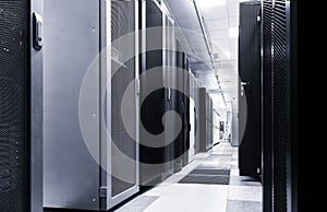 Modern server room interior in big datacenter for exchanging cyber data, cloud computing and connection, Black and white toning