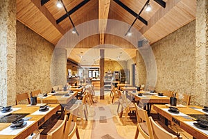 Modern Shabu and Sukiyaki Restaurant decorated with wood and concrete, warm, cozy and feels like home for special family meal