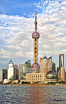 Modern Shanghai skyline with tower at sunset