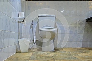 Modern shite plain clean toilet bathroom, white toiler bowl in a bathroom