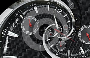 Modern silver black fashion clock watch red clock hands twisted to surreal time spiral. Surrealism clock black clock watch abstrac