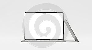 Modern Silver Laptop with Open Screen and Closed Lid on White Surface