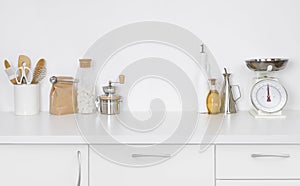 Modern simple kitchen counter interior with kitchenware on white background