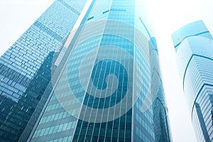 Modern sky scrapers,glass tower buildings in business district with financial offices on sky background, architecture