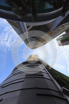 Modern Skyscraper Building against blue sky.