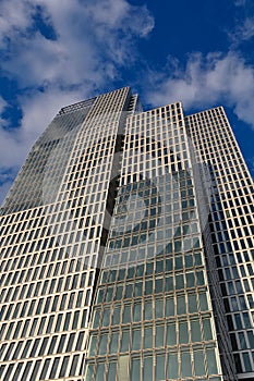 Modern Skyscraper Building with Clouds