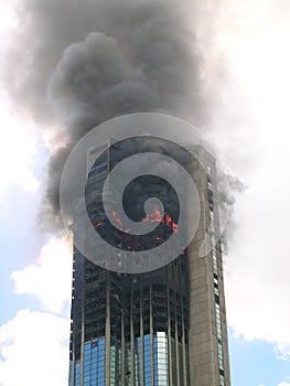 Modern skyscraper building on fire